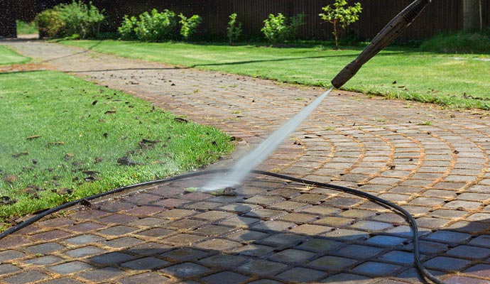 Power washing for street cleaning and maintenance.